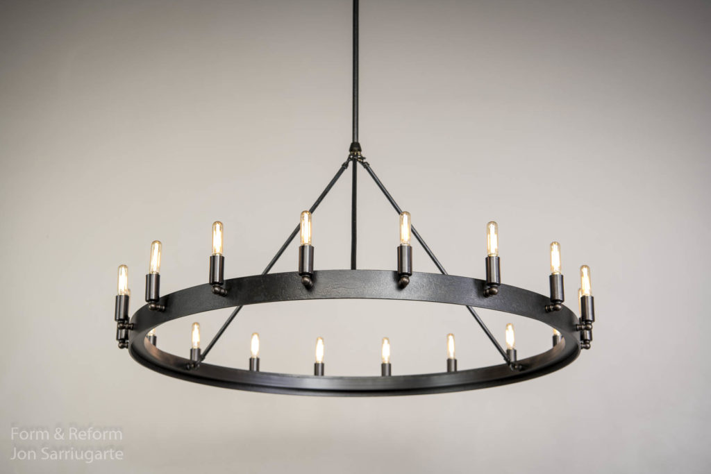 I made this light for my mother in law Jackie Mate. She wanted to replace the over the top scrolled wrought iron fixture that came with their new home. I had made her a light for her last home and the new owner insisted it stay with the home. It needed to fit with the other iron fixture but stay simple. Borrowing from the lights I did for Harvard, the RH hit Camino and Gioa with came up with our new light Mate. Looking forward to holiday meals under this light! https://formandreform.com/mate-36/