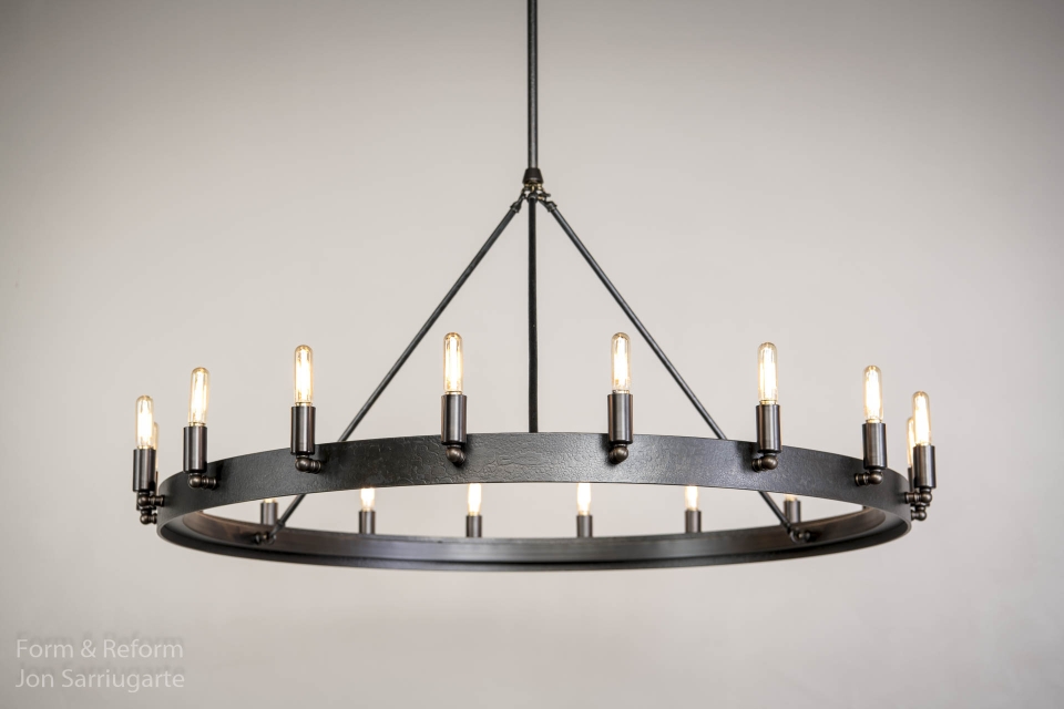 I made this light for my mother in law Jackie Mate. She wanted to replace the over the top scrolled wrought iron fixture that came with their new home. I had made her a light for her last home and the new owner insisted it stay with the home. It needed to fit with the other iron fixture but stay simple. Borrowing from the lights I did for Harvard, the RH hit Camino and Gioa with came up with our new light Mate. Looking forward to holiday meals under this light! https://formandreform.com/mate-36/ I made this light for my mother in law Jackie Mate. She wanted to replace the over the top scrolled wrought iron fixture that came with their new home. I had made her a light for her last home and the new owner insisted it stay with the home. It needed to fit with the other iron fixture but stay simple. Borrowing from the lights I did for Harvard, the RH hit Camino and Gioa with came up with our new light Mate. Looking forward to holiday meals under this light! https://formandreform.com/mate-36/